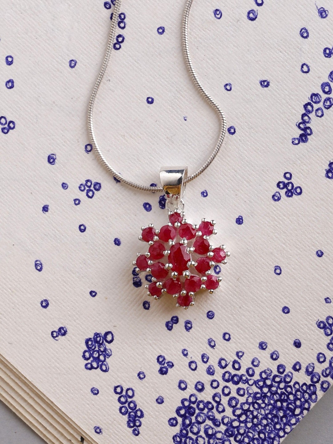 

Exotic India Silver-Plated Floral Pendants
