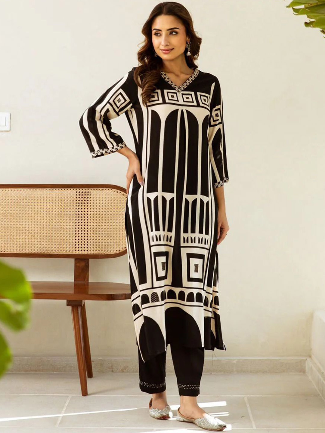 

Anouk Black Printed Straight Kurta with Trousers