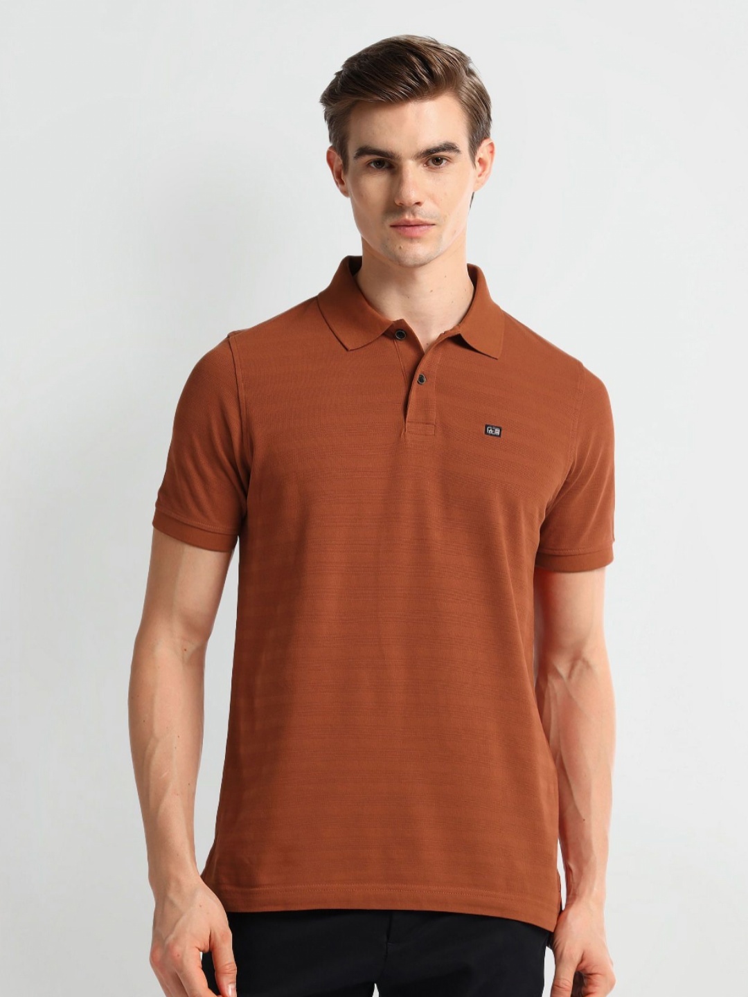 

Arrow Sport Men Solid Polo Collar Cotton Tshirt, Orange