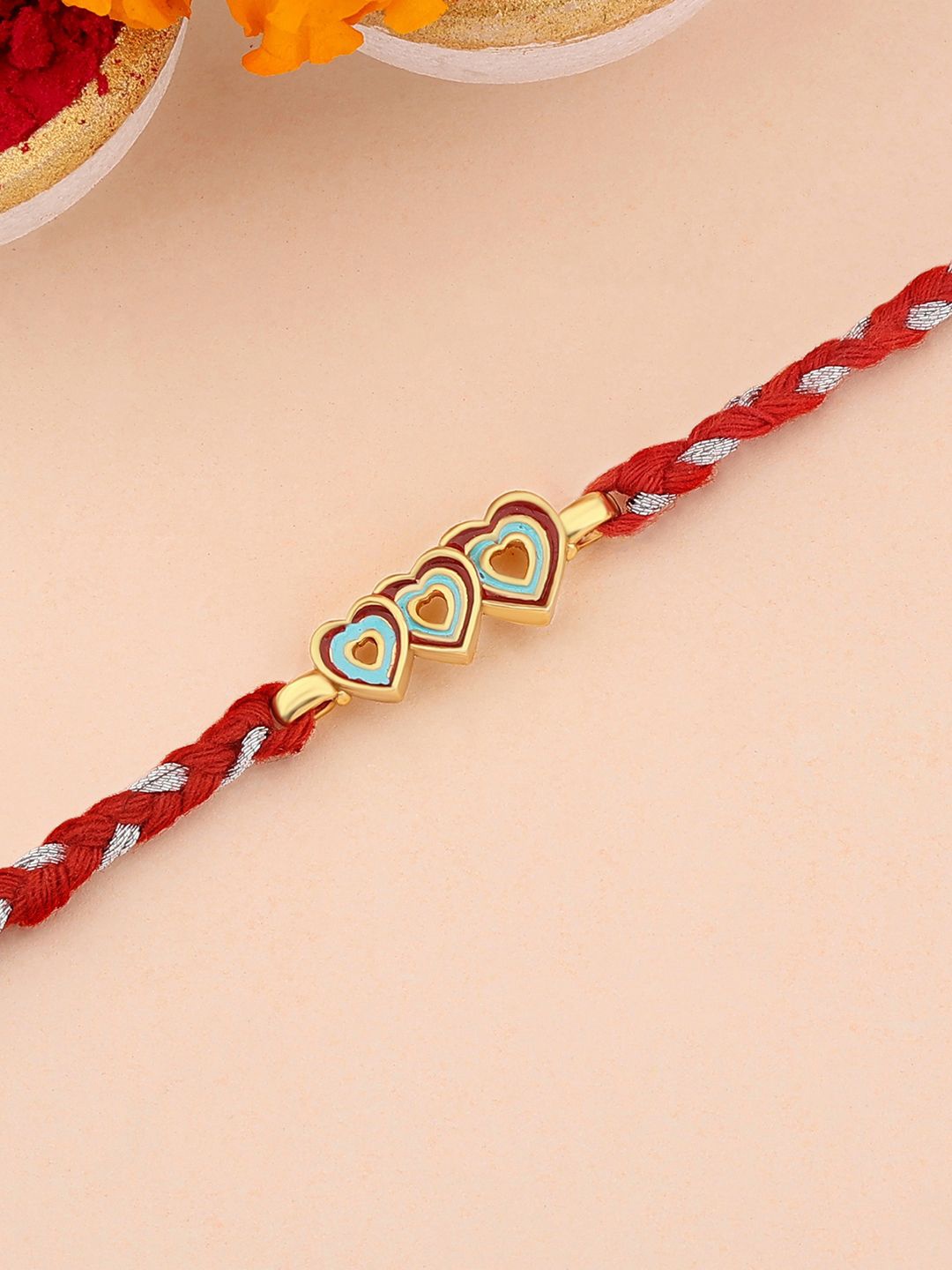 

Ornate Jewels 925 Silver 18K Gold Plated Three Heart Charm Thread Rakhi With Roli Chawal