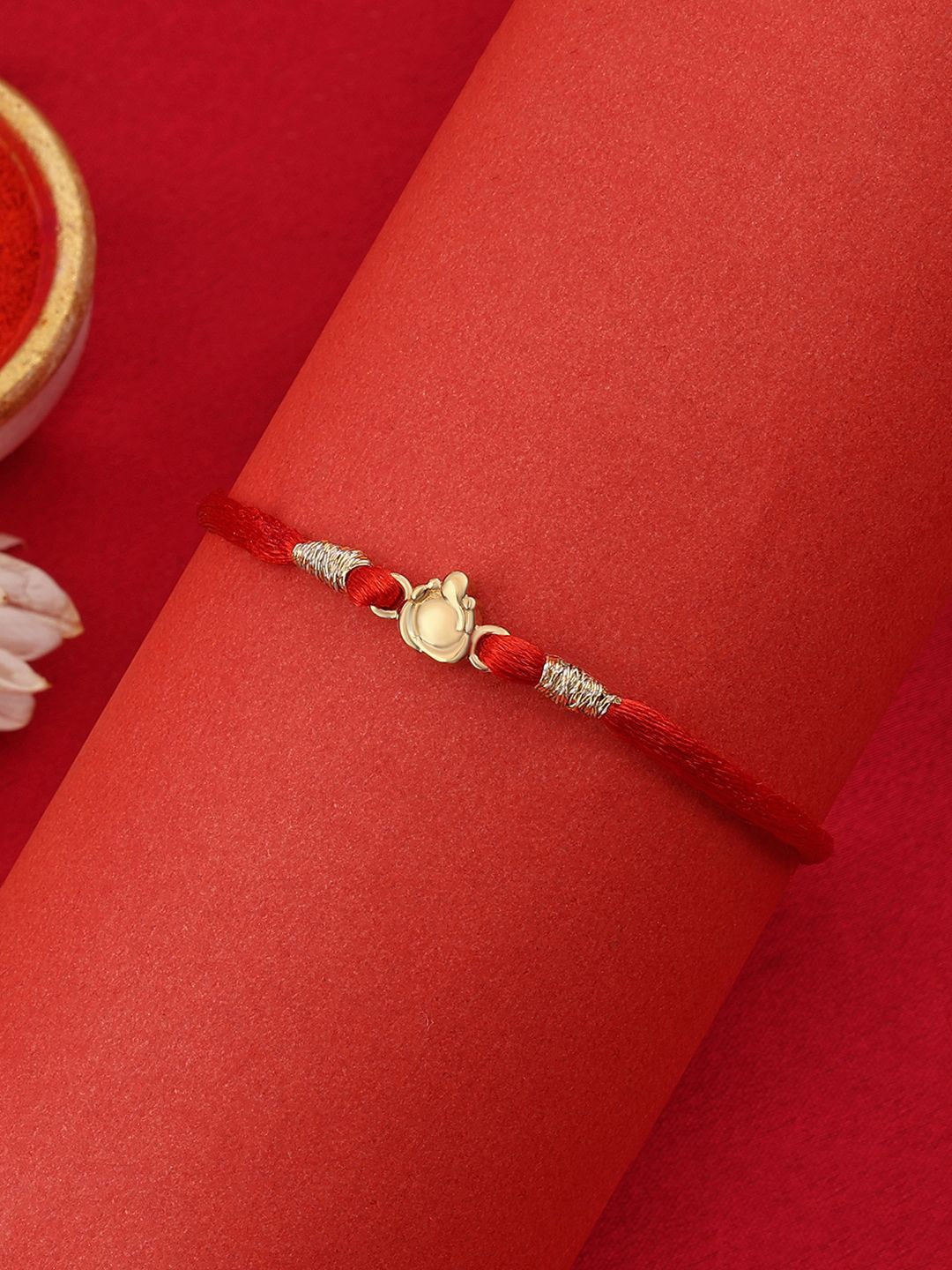 

Ornate Jewels 925 Silver 18K Gold Plated Little Ganesha Rakhi With Roli Chawal
