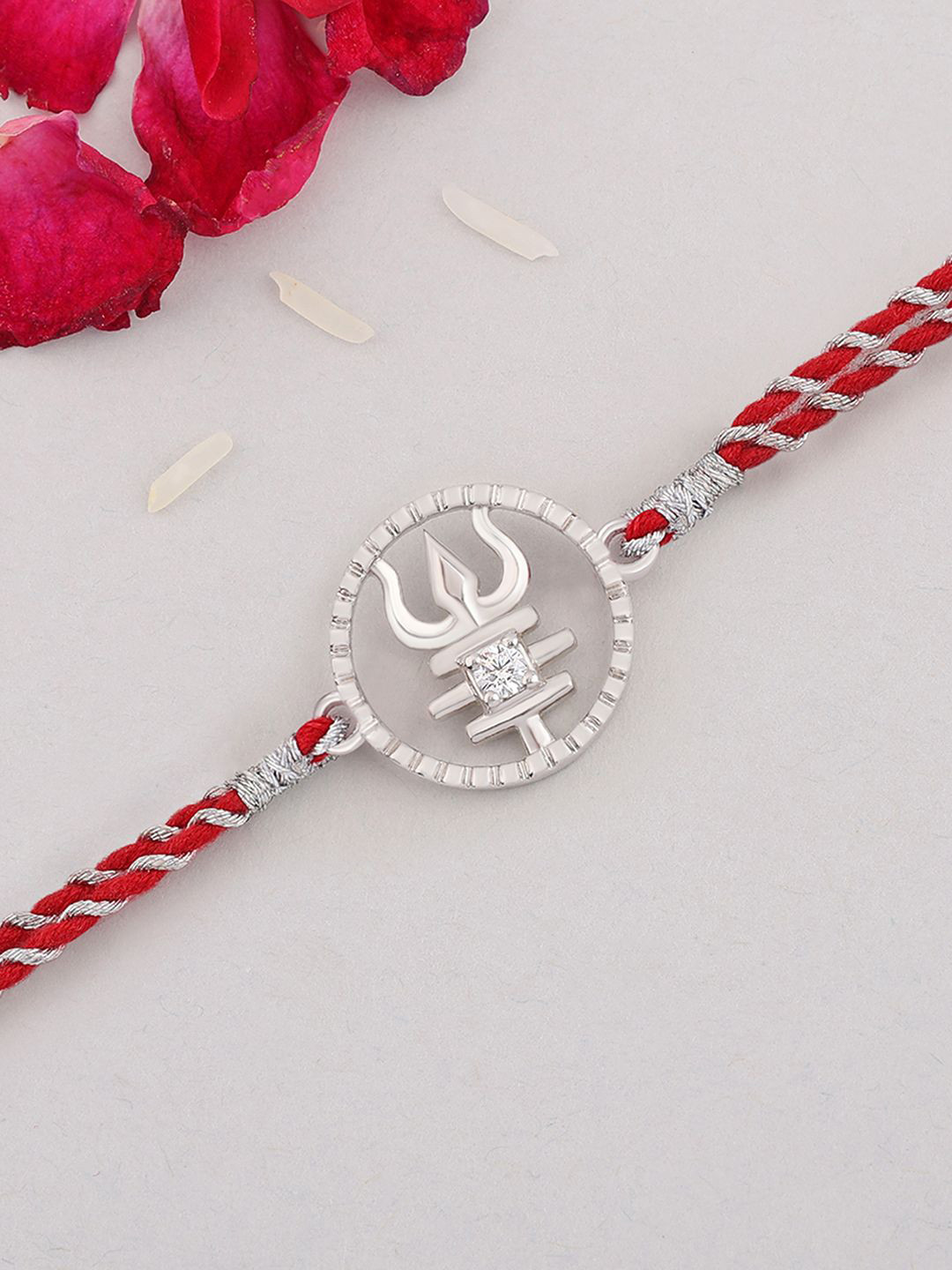 

Ornate Jewels 925 Silver American Diamond Trishul Thread Rakhi With Roli Chawal