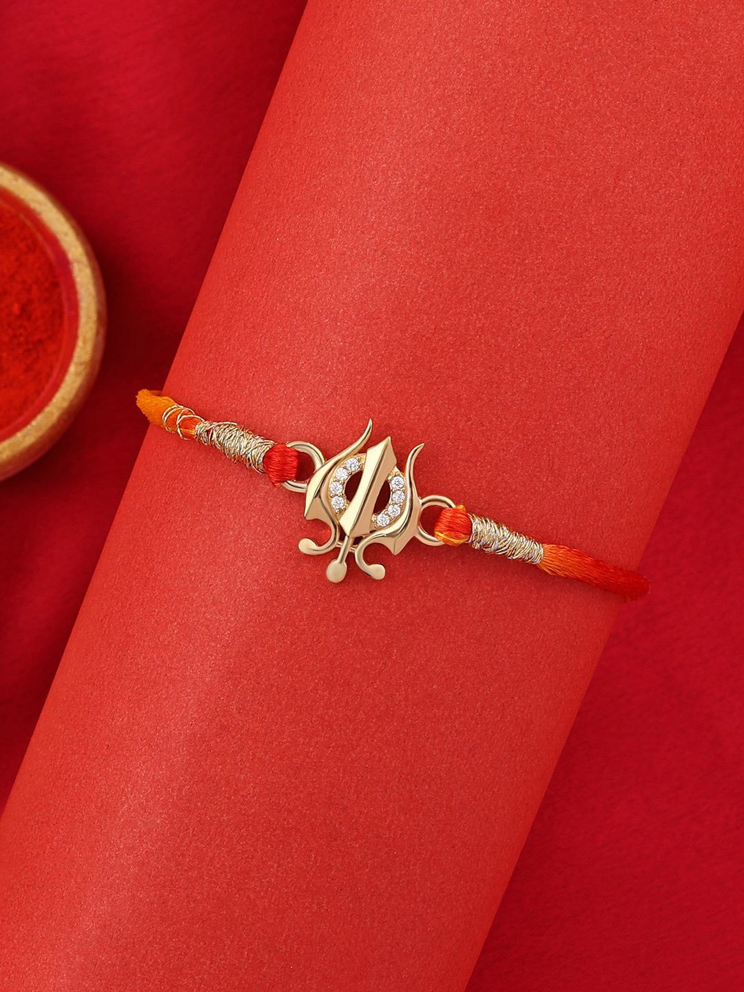 

Ornate Jewels 925 Silver 18K Gold Plated Trishul Thread Rakhi With Roli Chawal