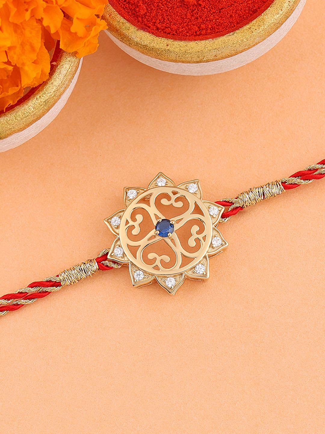 

Ornate Jewels 925 Silver 18K Gold Plated Sapphire & American Diamond Thread Rakhi
