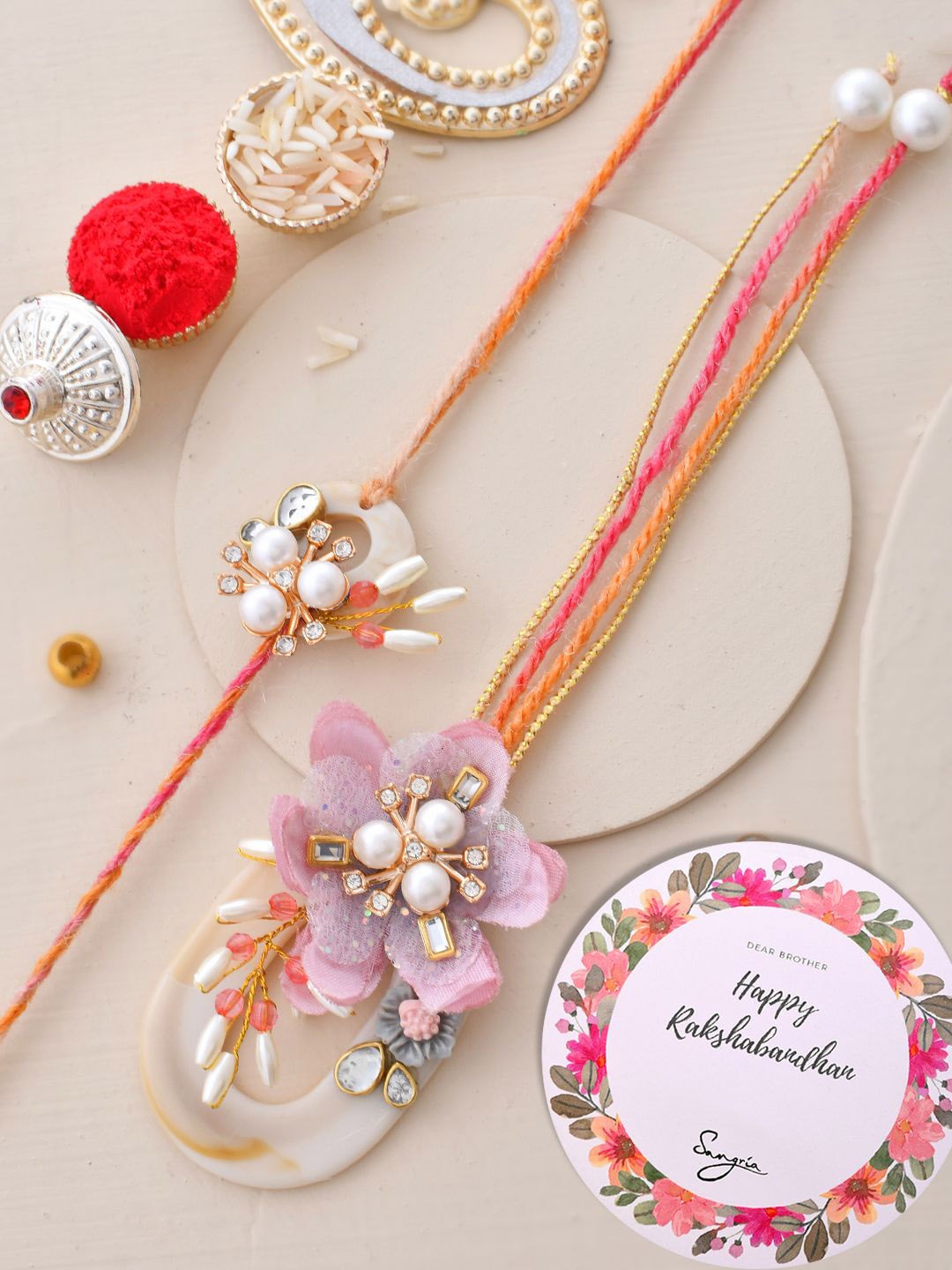 

Sangria Bhaiya Bhabhi Beaded Rakhis With Card & Roli Rice, Pink