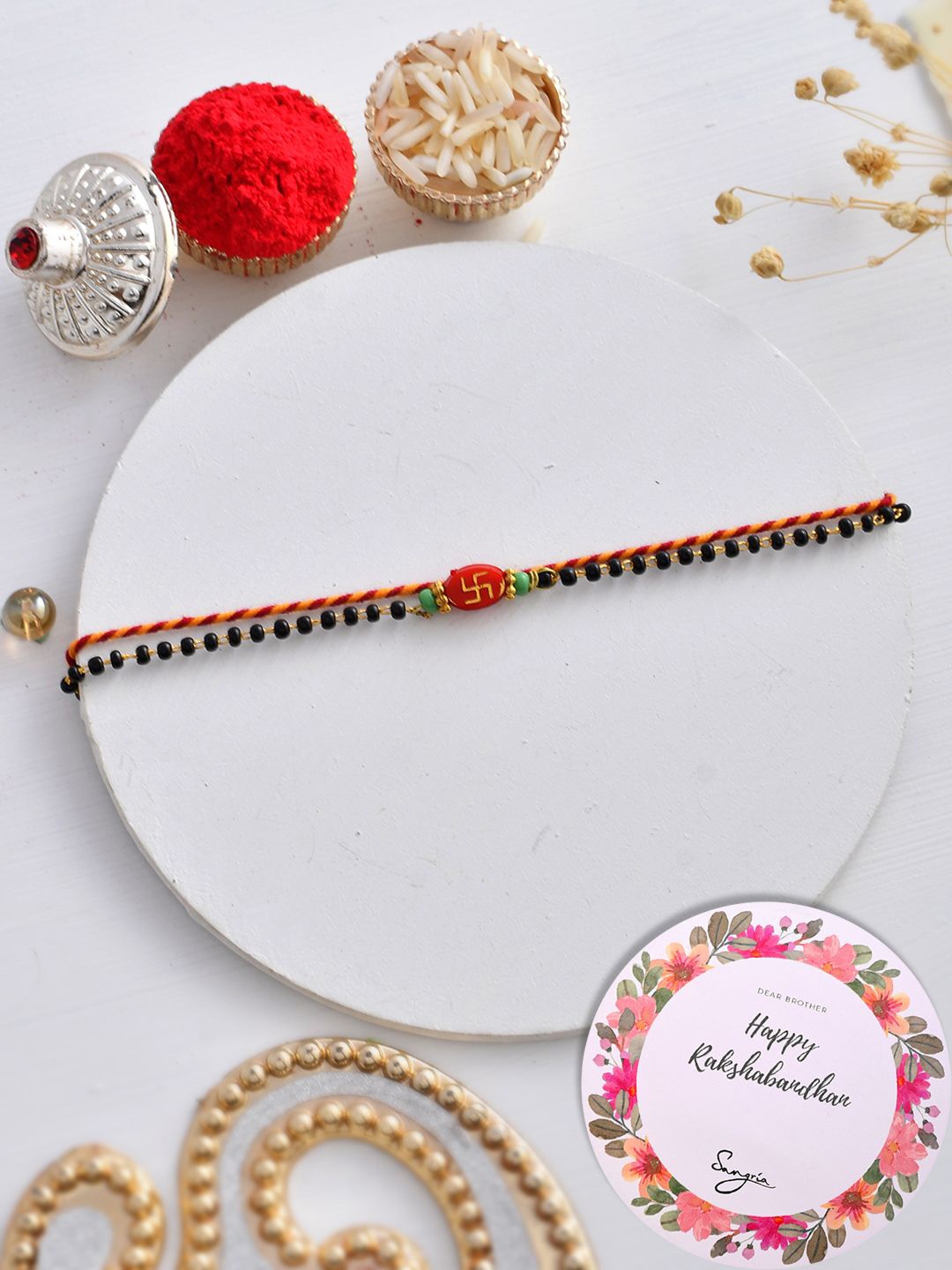 

Sangria Protective Sattvik Nazarbattu Beaded Rakhi Greeting Card & Roli Chawal, Red