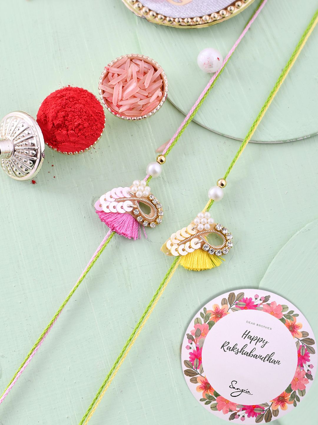 

Sangria Set Of 2 Beaded Rakhi Greeting Card & Roli Chawal, Pink