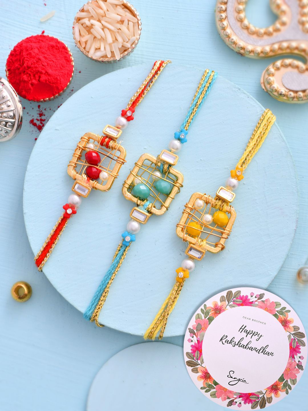 

Sangria Set Of 3 Beaded Thread Rakhis With Roli Chawal & Greeting Card, Red