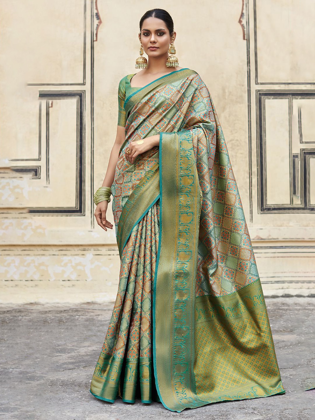 

Panzora Woven Design Zari Sarees, Teal