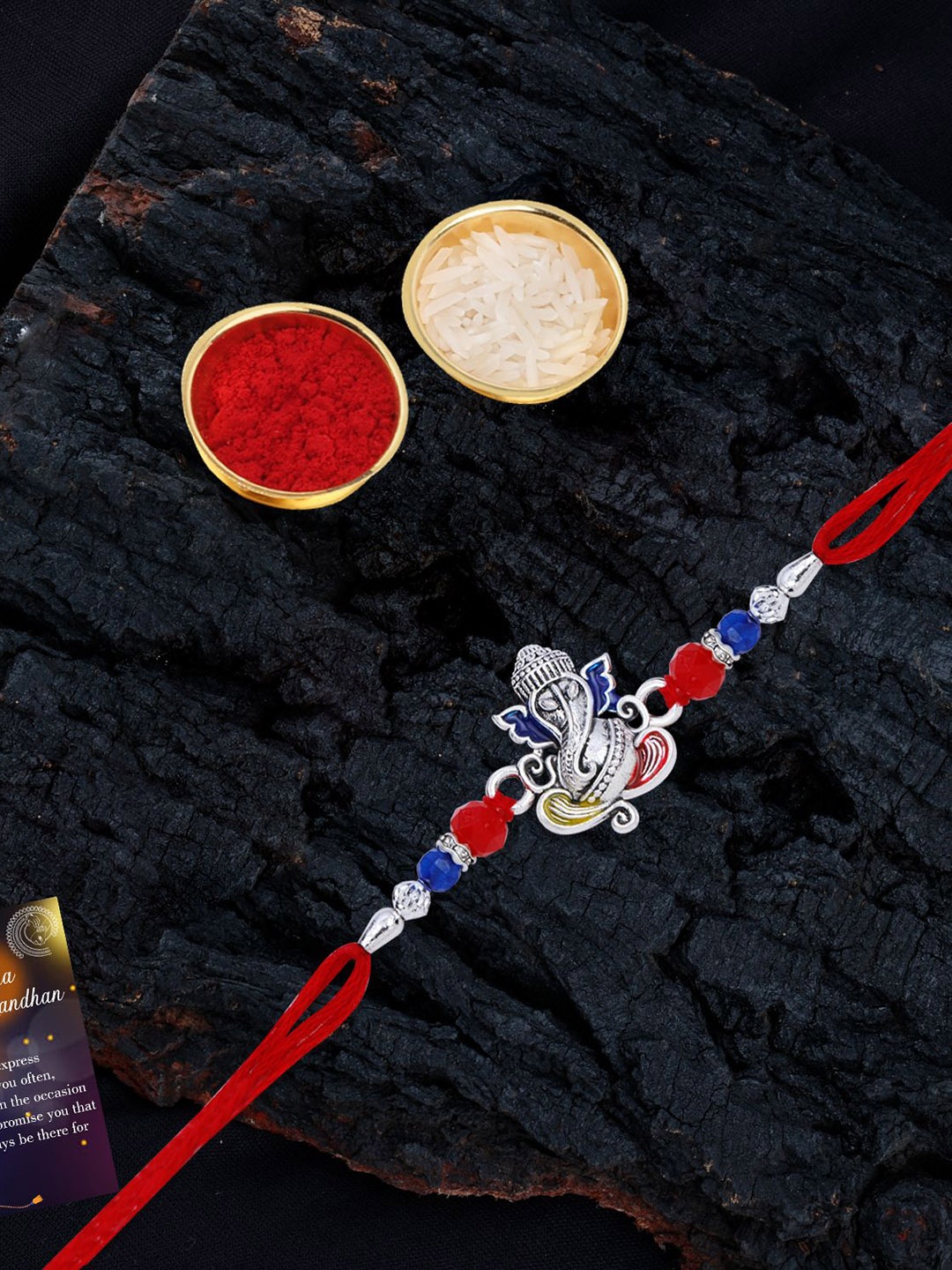 

Silver Shine Set Of 2 Beaded and Ganesha Thread Rakhis with Greeting Card & Roli Chawal, Gold