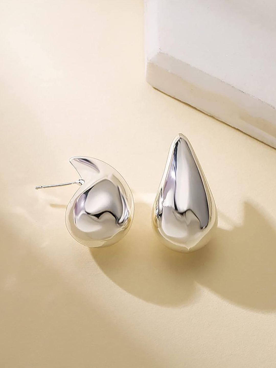 

YouBella Silver-Plated Teardrop Shaped Studs Earrings