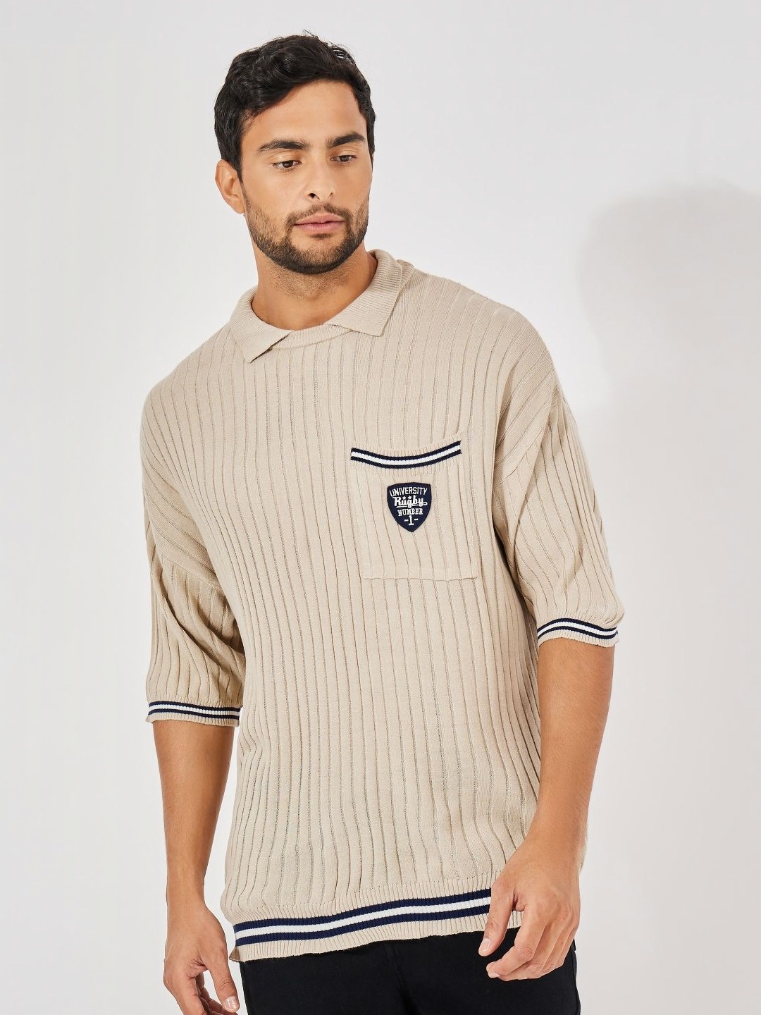 

Styli Men Premium Knit Relaxed Varsity Polo T-shirt With Pocket Badge, Cream