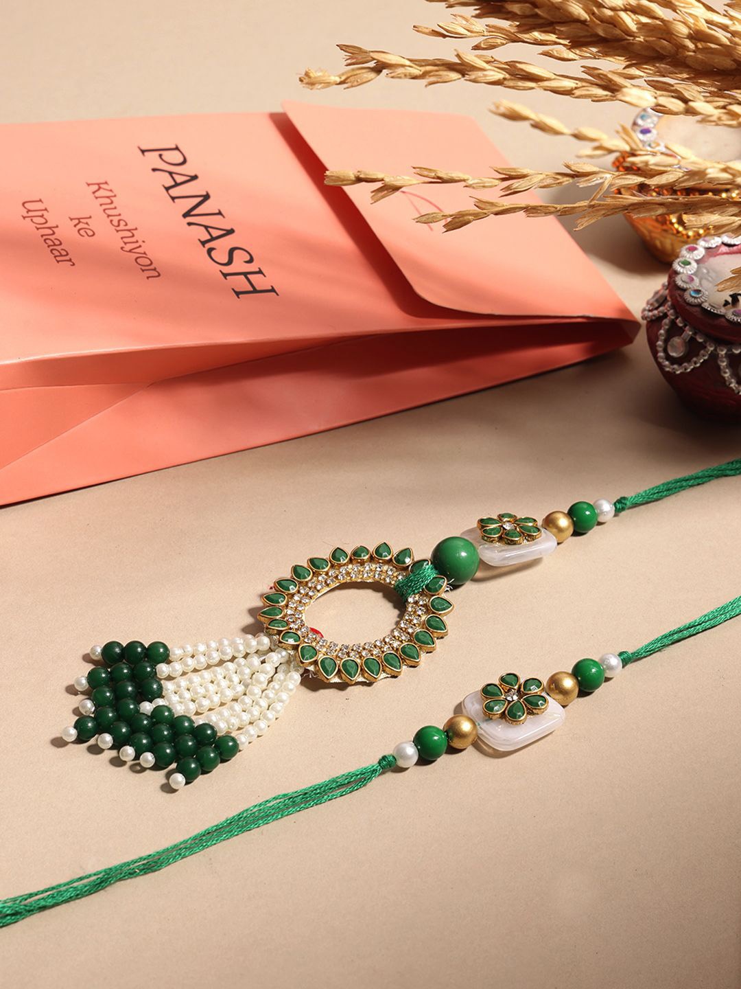 

PANASH Set Of 2 Gold Plated Beaded & Studded Lumba and Thread Rakhis With Roli Chawal