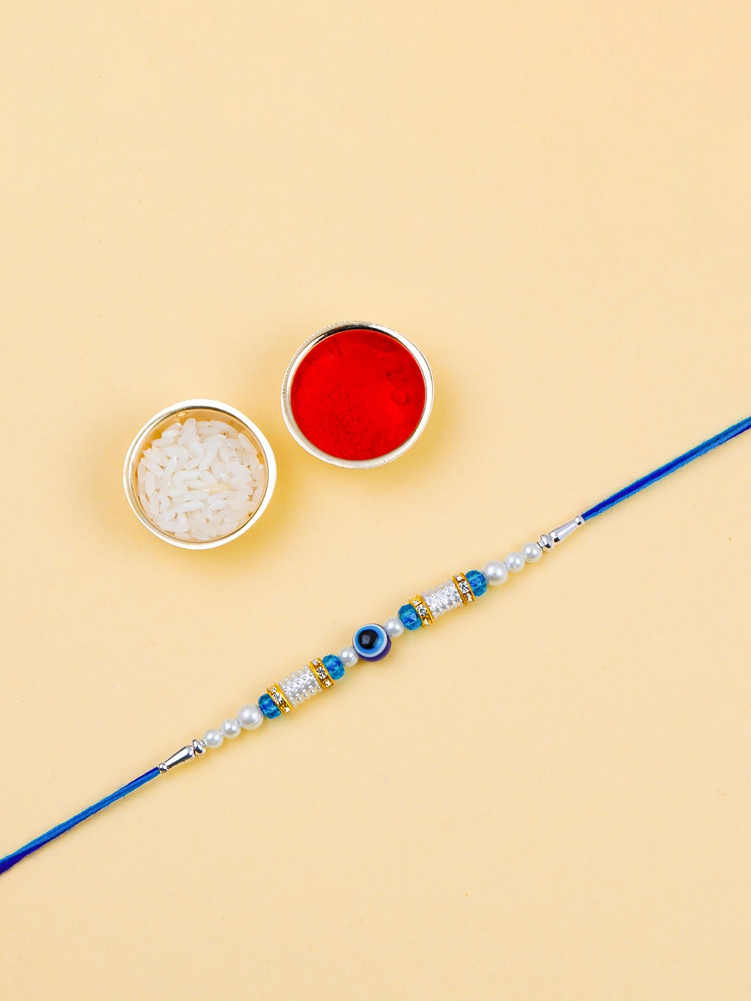 

Silver Shine Bhaiya Bhabhi Rakhi With Roli Chawal, Gold
