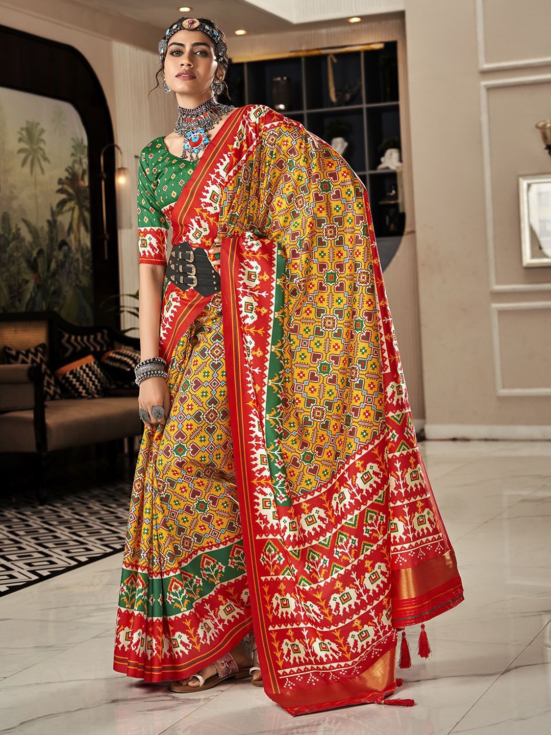 

Panzora Women Ethnic Motifs Printed Patola Saree, Yellow