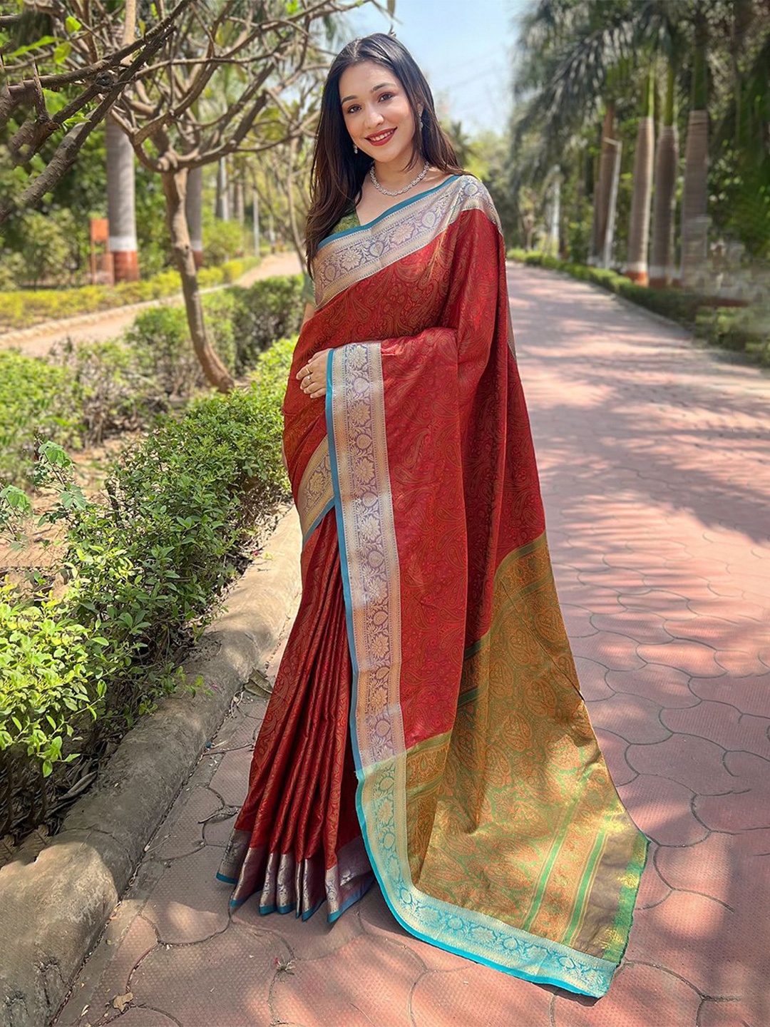 

LeeliPeeri Designer Ethnic Motif Zari Woven Saree, Rust