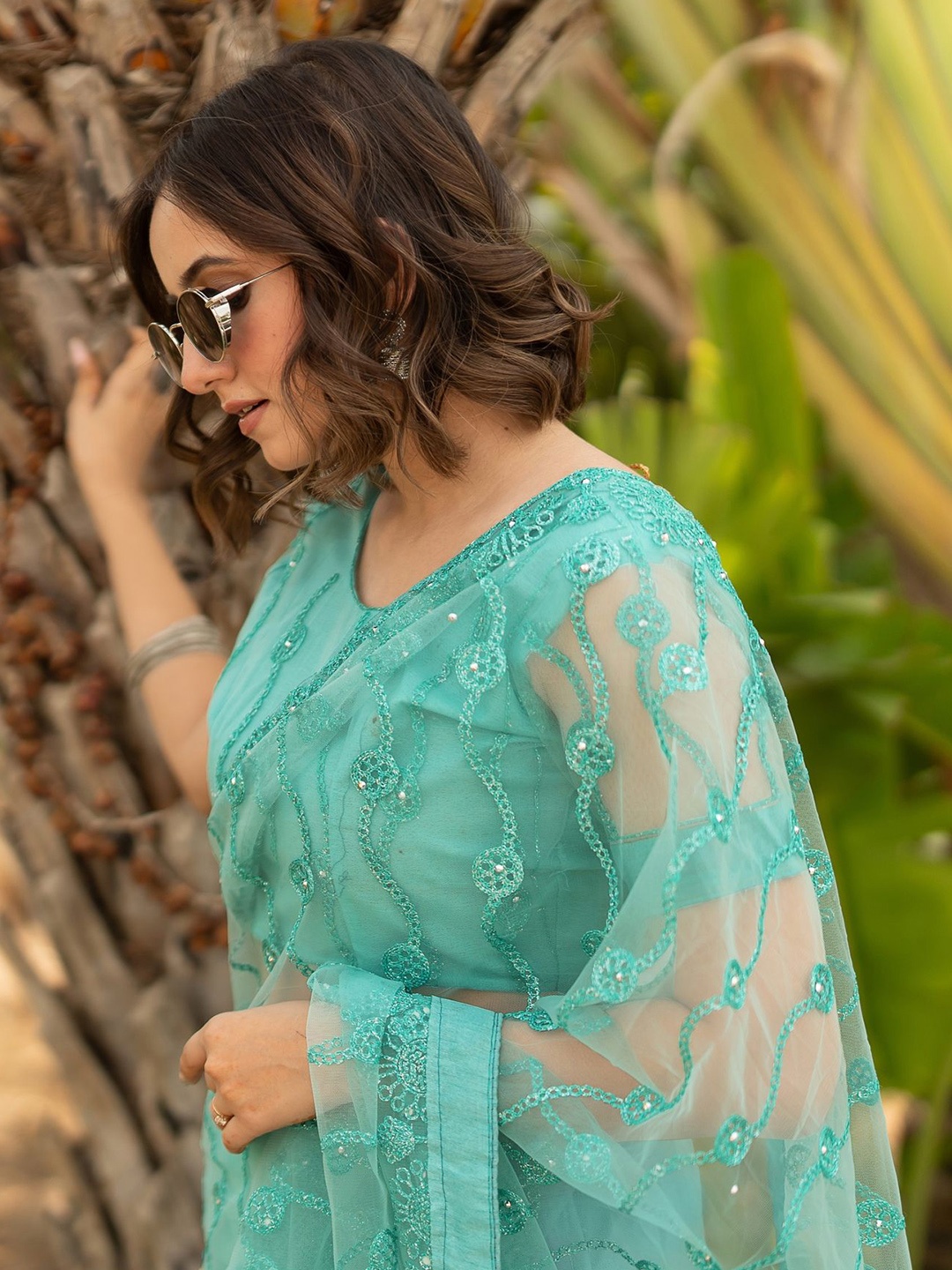 

Subham Embroidered Beads and Stones Net Saree, Turquoise blue