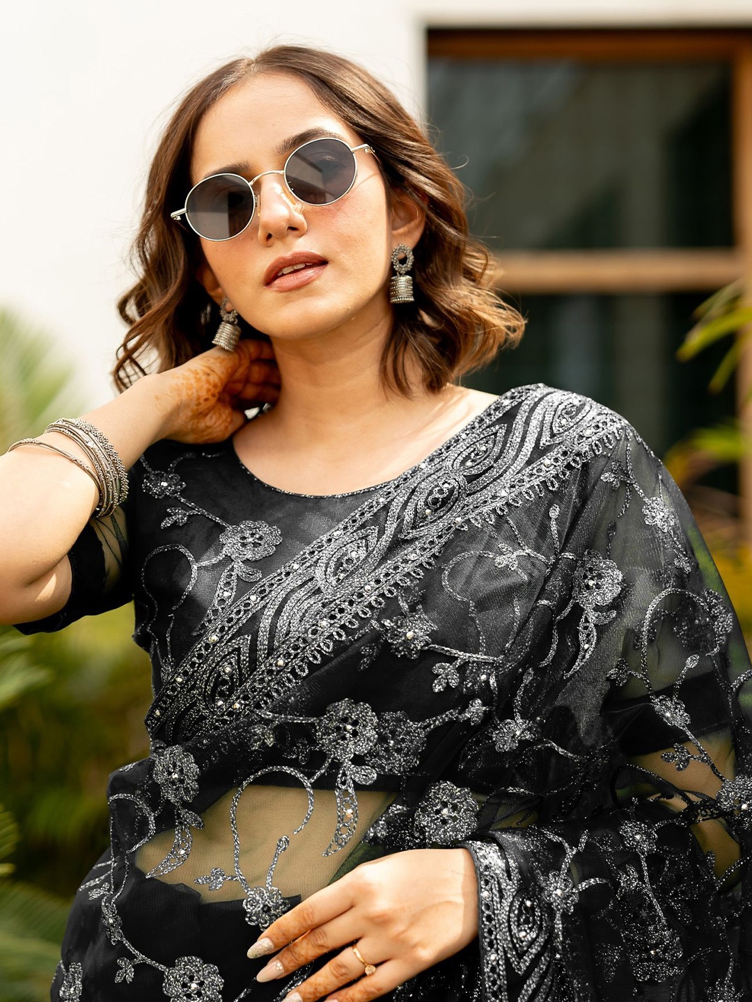 

Subham Women Embellished Beads and Stones Net Saree, Black