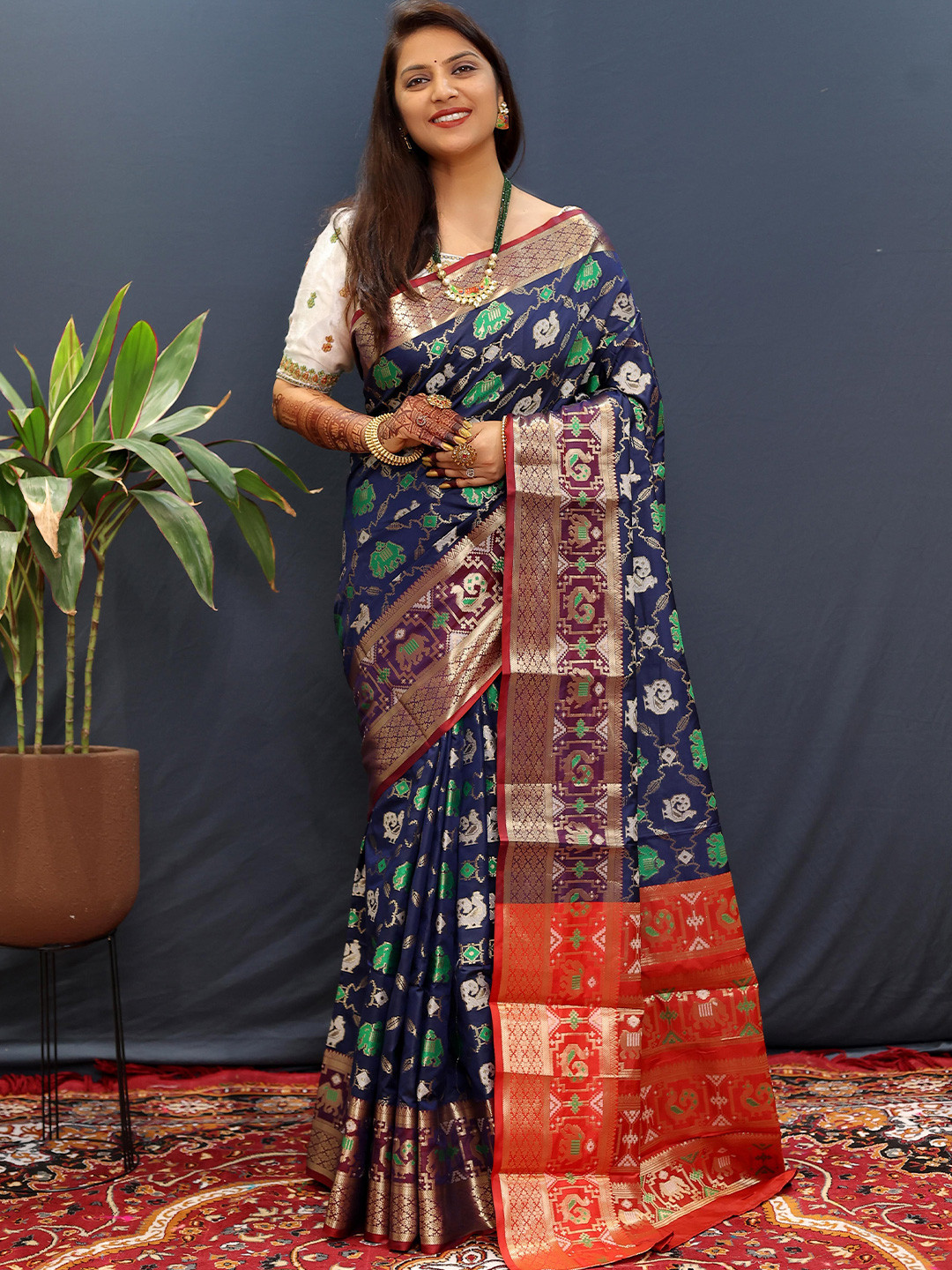 

KIMISHA Ethnic Motifs Zari Woven Patola Saree, Navy blue