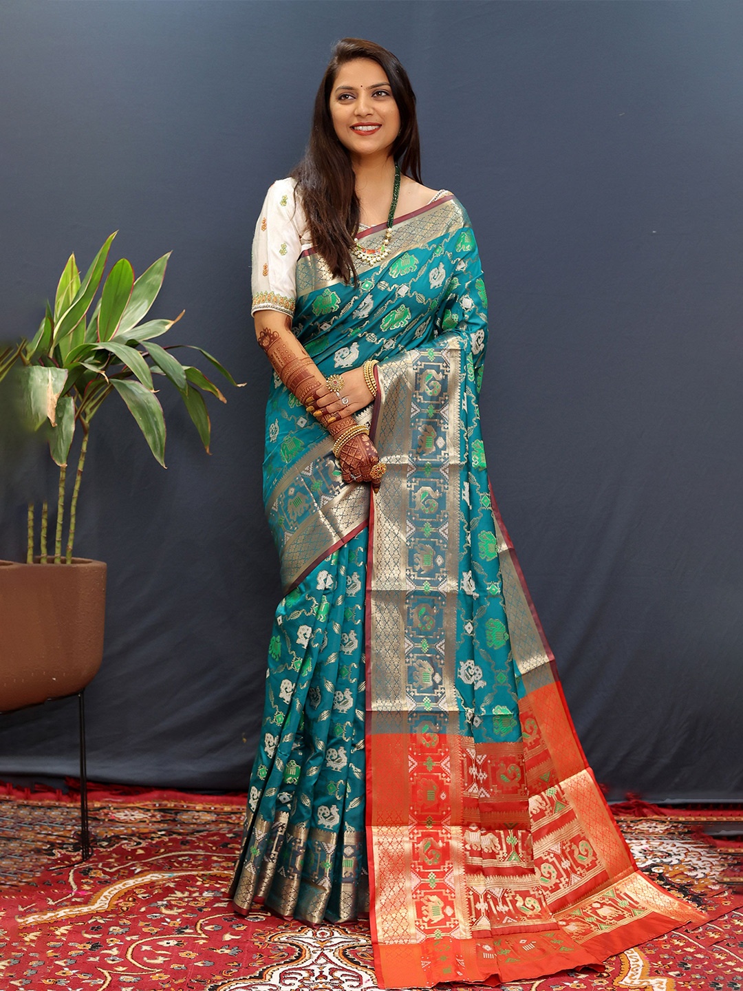 

KIMISHA Ethnic Motifs Zari Patola Saree, Turquoise blue