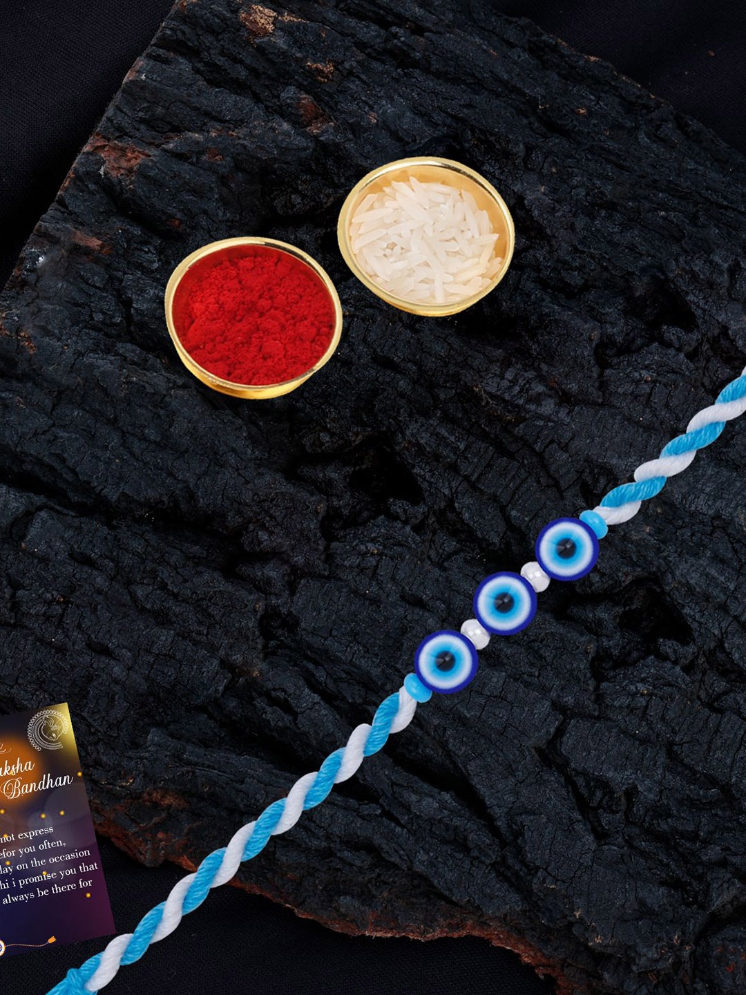 

Silver Shine Set Of 2 Evil Eye Beaded Thread Rakhis with Greeting Card & Roli Chawal, Gold
