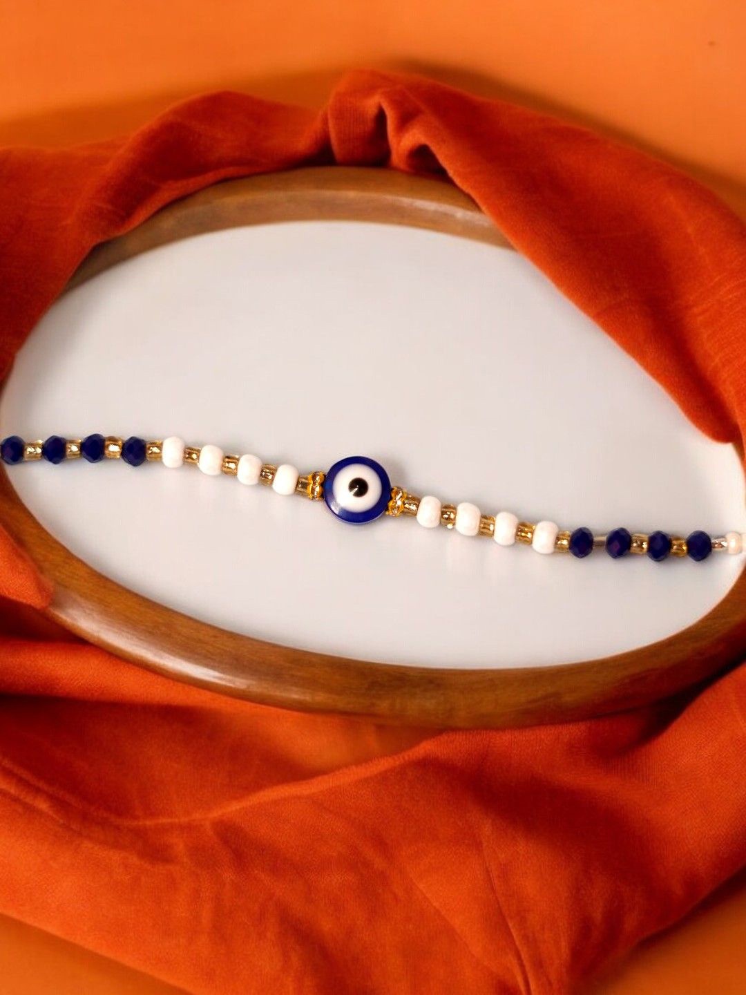 

ADIVA Gold-Plated Evil Eye & Beaded Charm Thread Rakhi