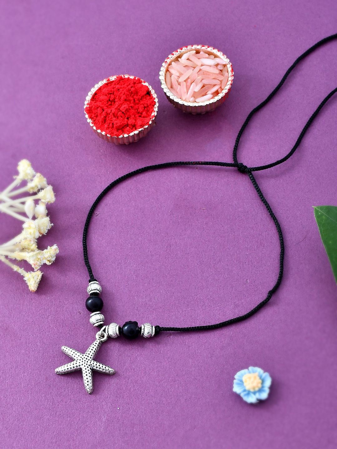 

Sangria Silver Starfish Patterned Divine Threaded Rakhi With Greeting Card & Roli Chawal