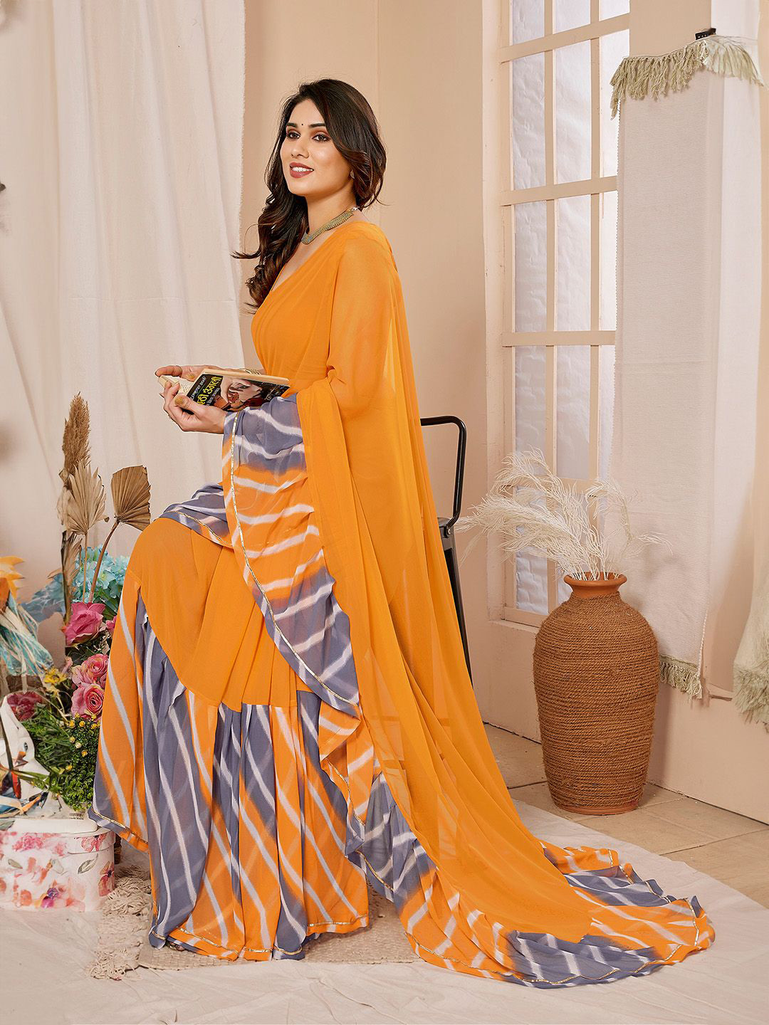 

Ishin Poly Georgette Saree, Yellow