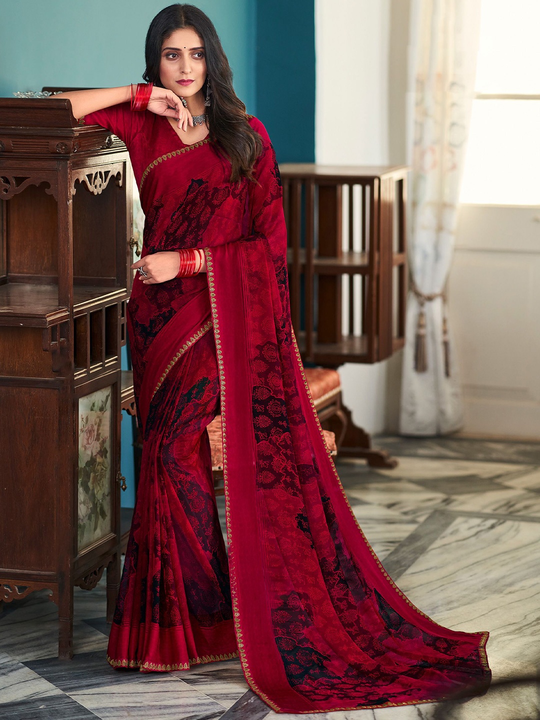 

Laxmipati Ethnic Motifs Embroidered Saree, Maroon
