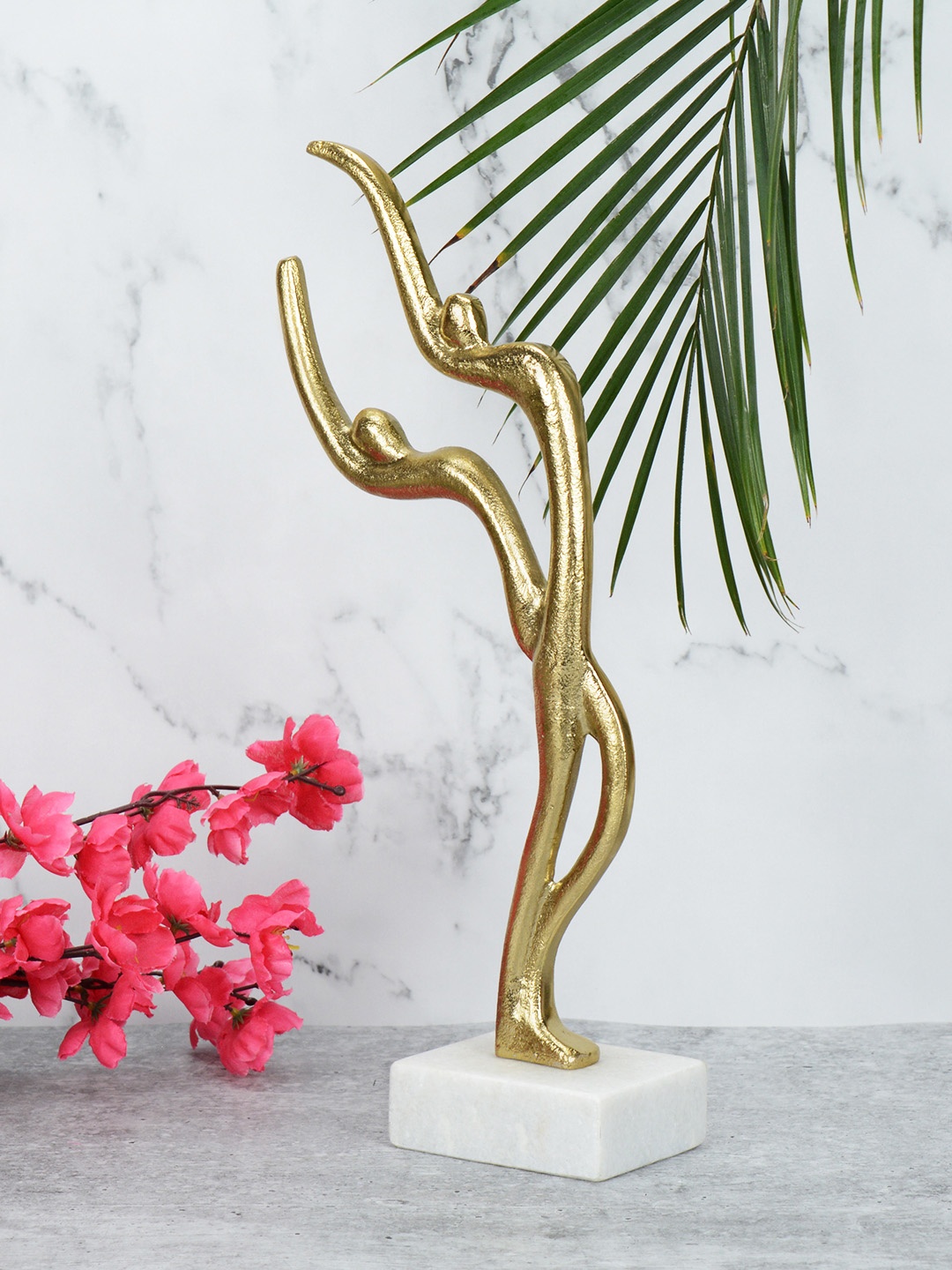 

Maison Modern Gold Toned Figurine Showpiece