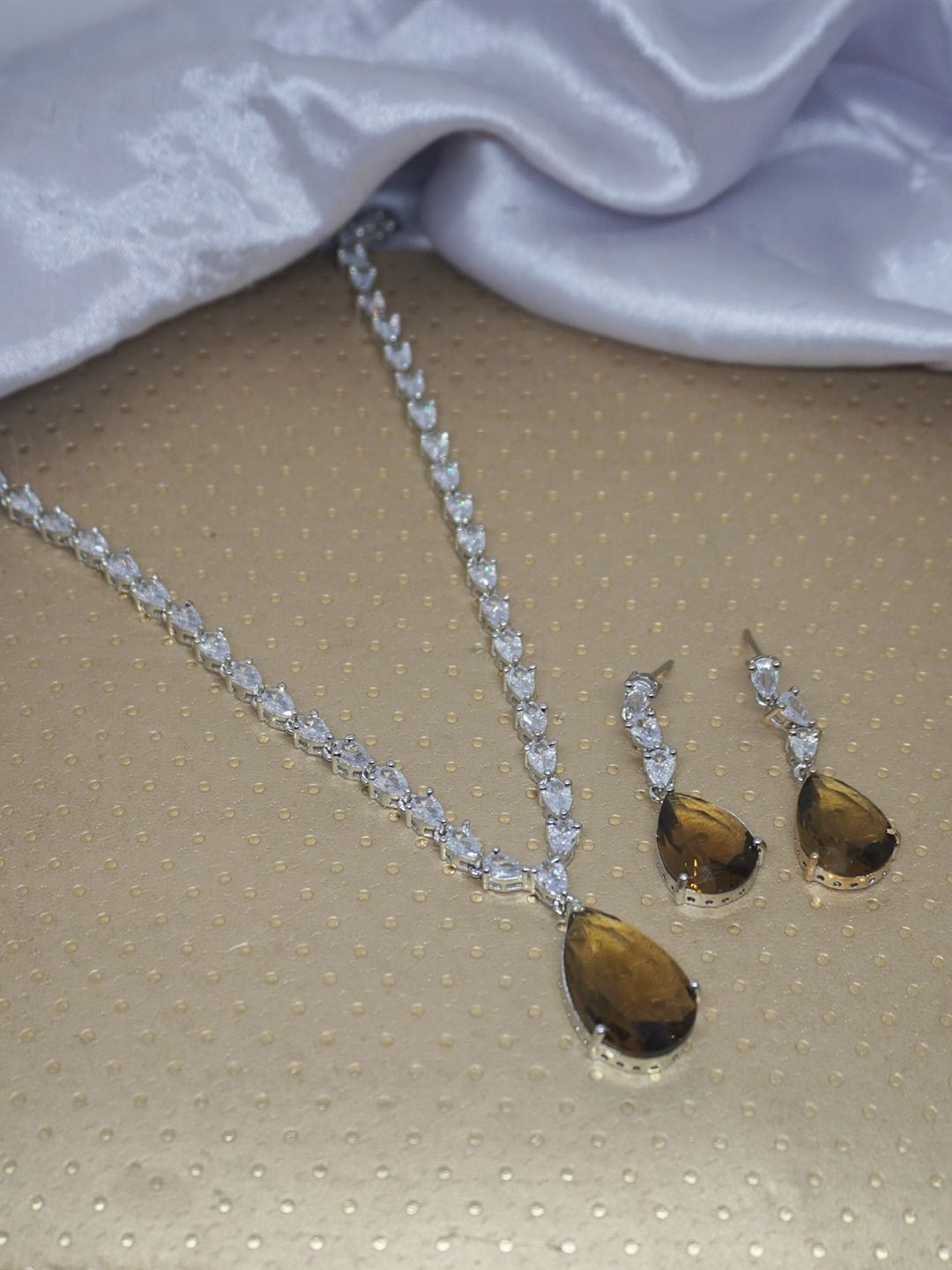 

Niscka Rhodium Plated American Diamond Stone Studded Jewellery Set, Silver
