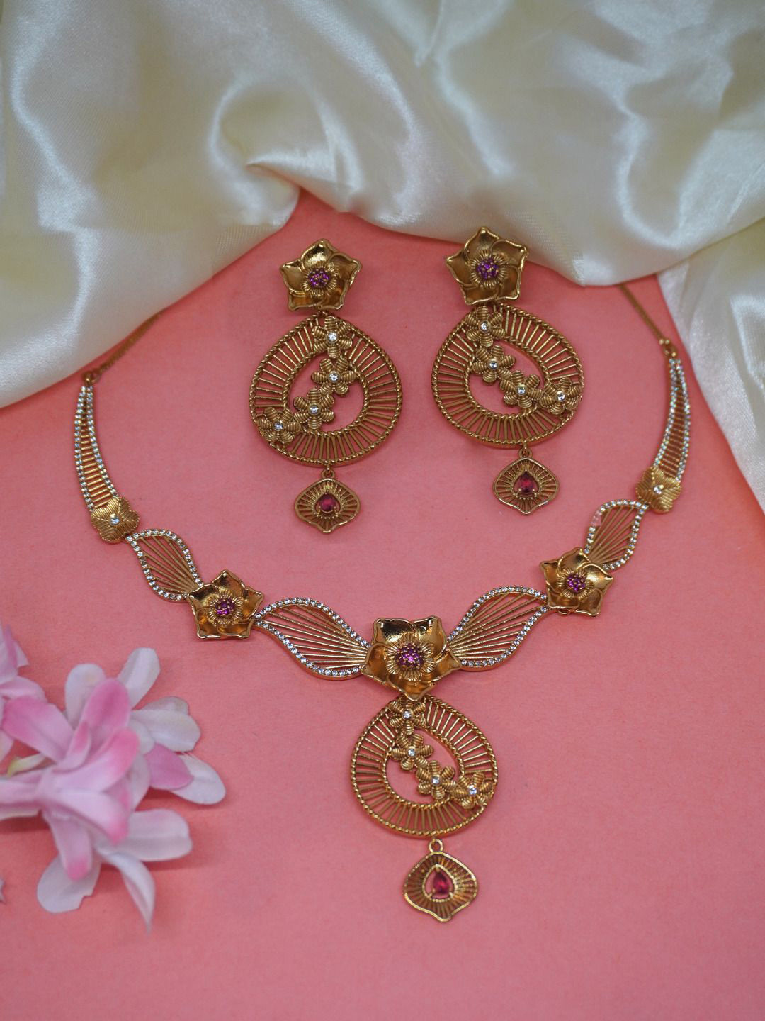 

Niscka Gold-Plated Cubic Zirconia Stone-Studded Details Jewellery Set
