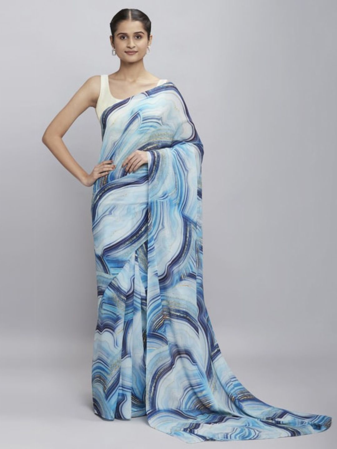 

Mitera Pure Georgette Abstract Saree, Blue