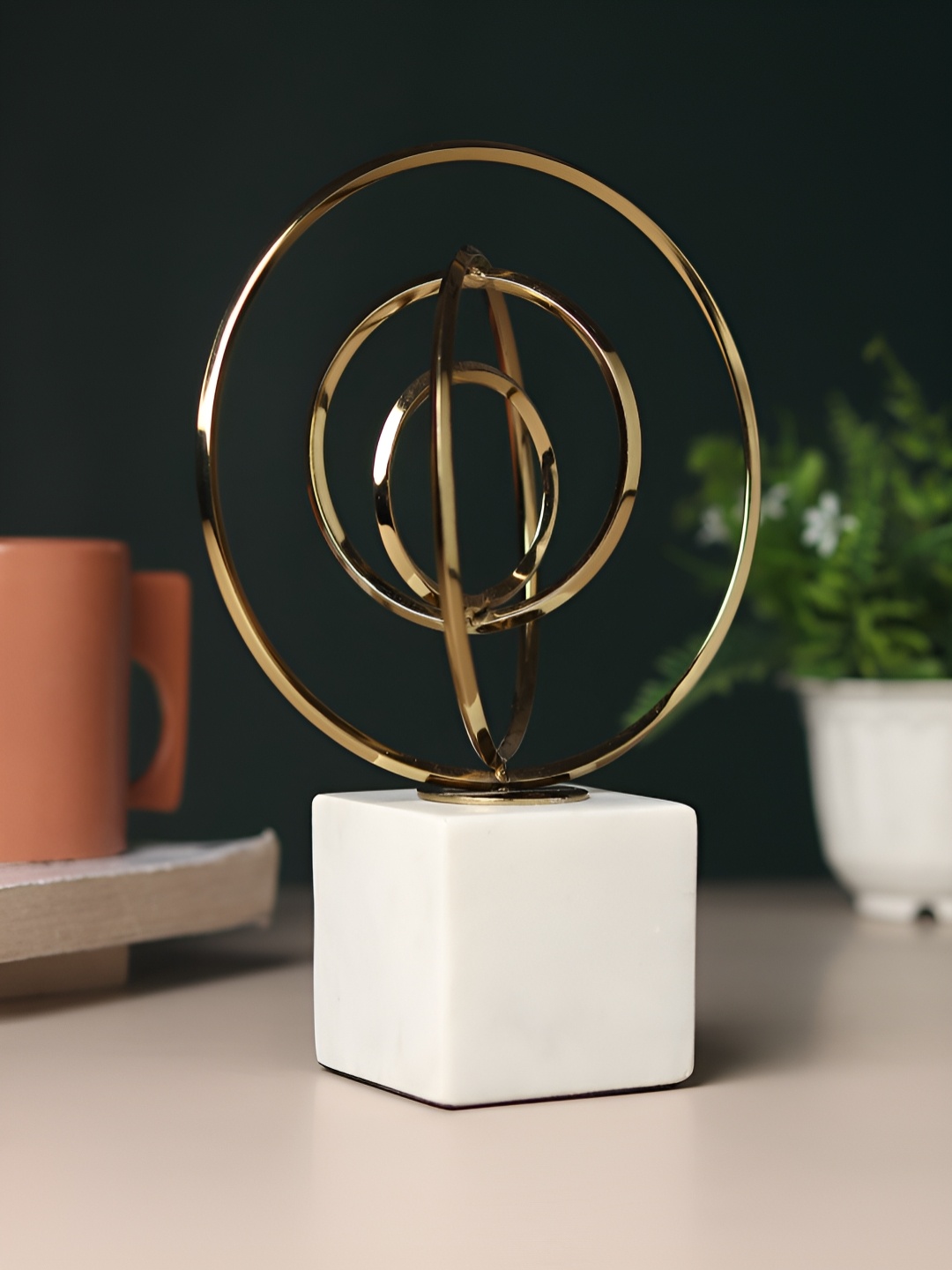 

Decor de Maison Gold-Toned & White Seamless Circle Small Curio Showpiece
