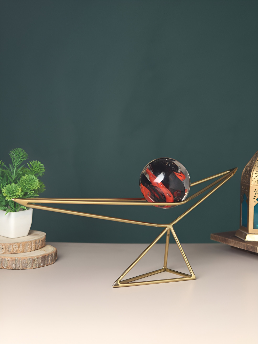 

Decor de Maison Orb's Gold-Toned & Red Small Curio Showpiece