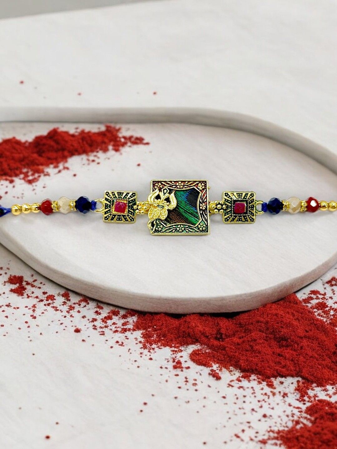 

ADIVA Gold Plated Mor Pankh & Beaded Rakhi