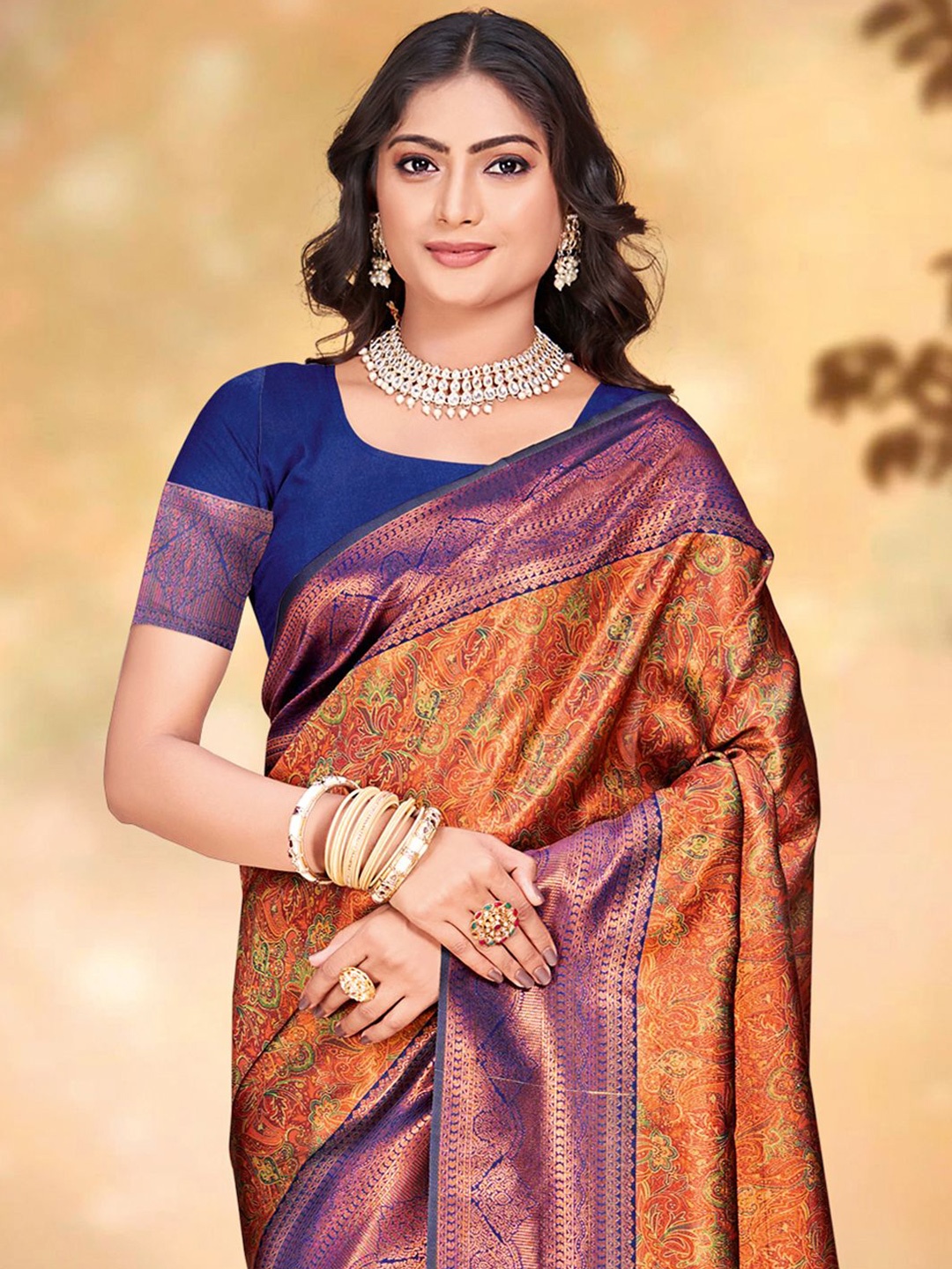 

Exclusiva Ethnic Motif Zari Woven Saree, Orange