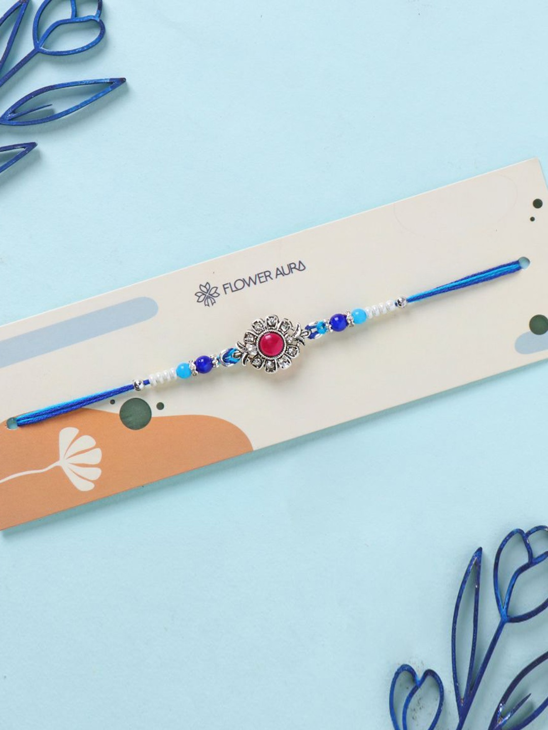 

Floweraura Antique Metal Stone Beaded Thread Rakhi with Roli Chawal, Blue