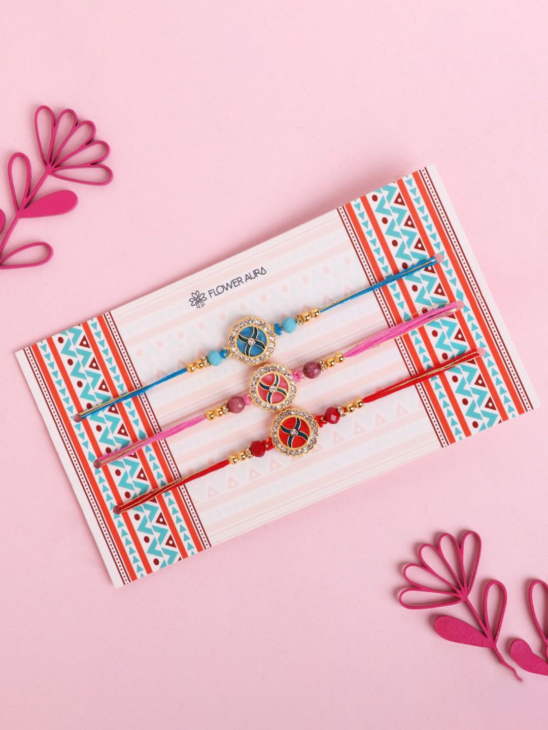 

Floweraura Set Of 3 Stone Studded & Beaded Thread Rakhi With Roli Chawal, Blue