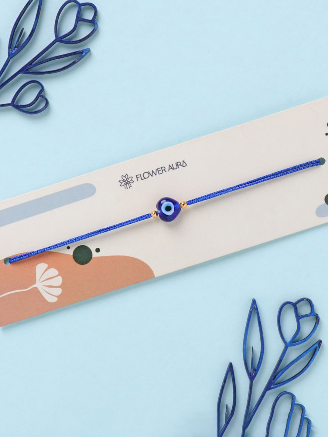 

Floweraura Evil Eye Beaded Thread Bracelet Rakhi with Roli Chawal, Blue