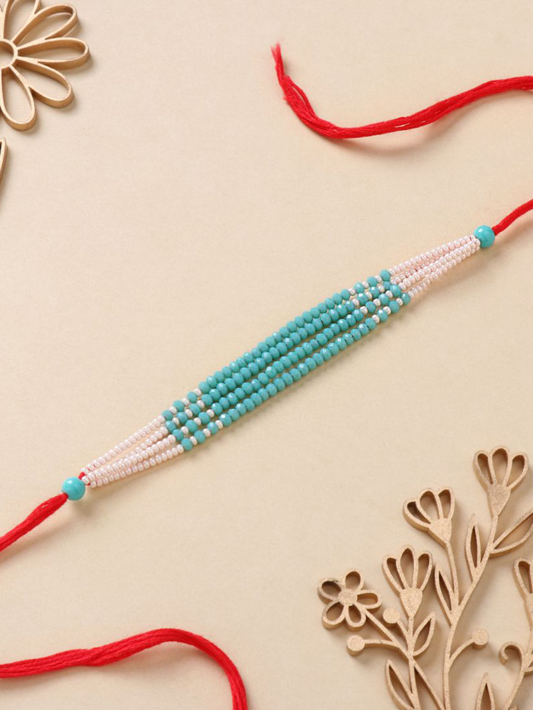 

Floweraura Bevy Beadwork Thread Rakhi with Roli Chawal, White