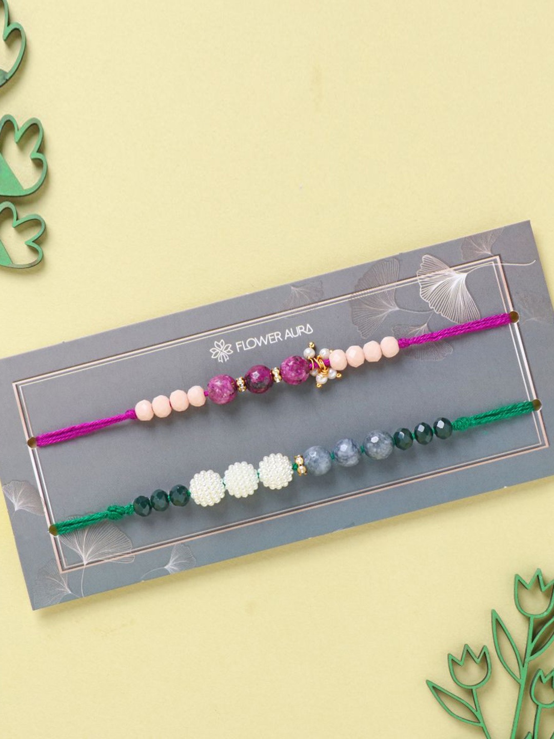 

Floweraura Set of 2 Beaded Thread Bracelet Rakhis with Roli Chawal, Green