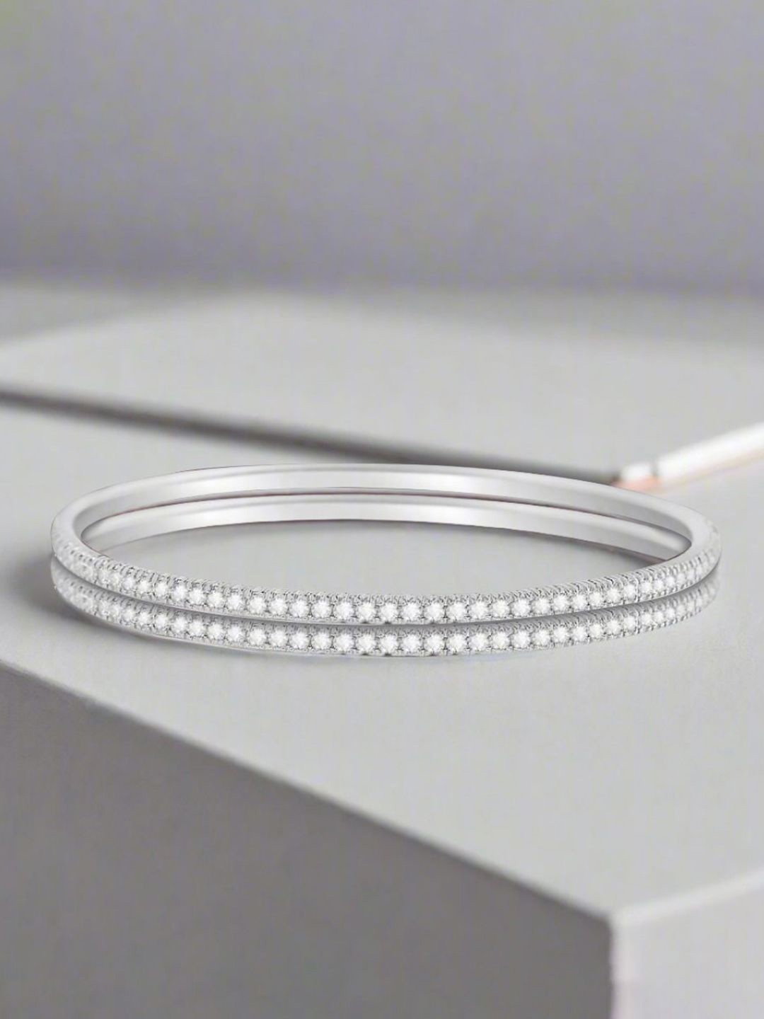 

Zavya 925 Pure Silver Rhodium-Plated Stone Studded Bangle