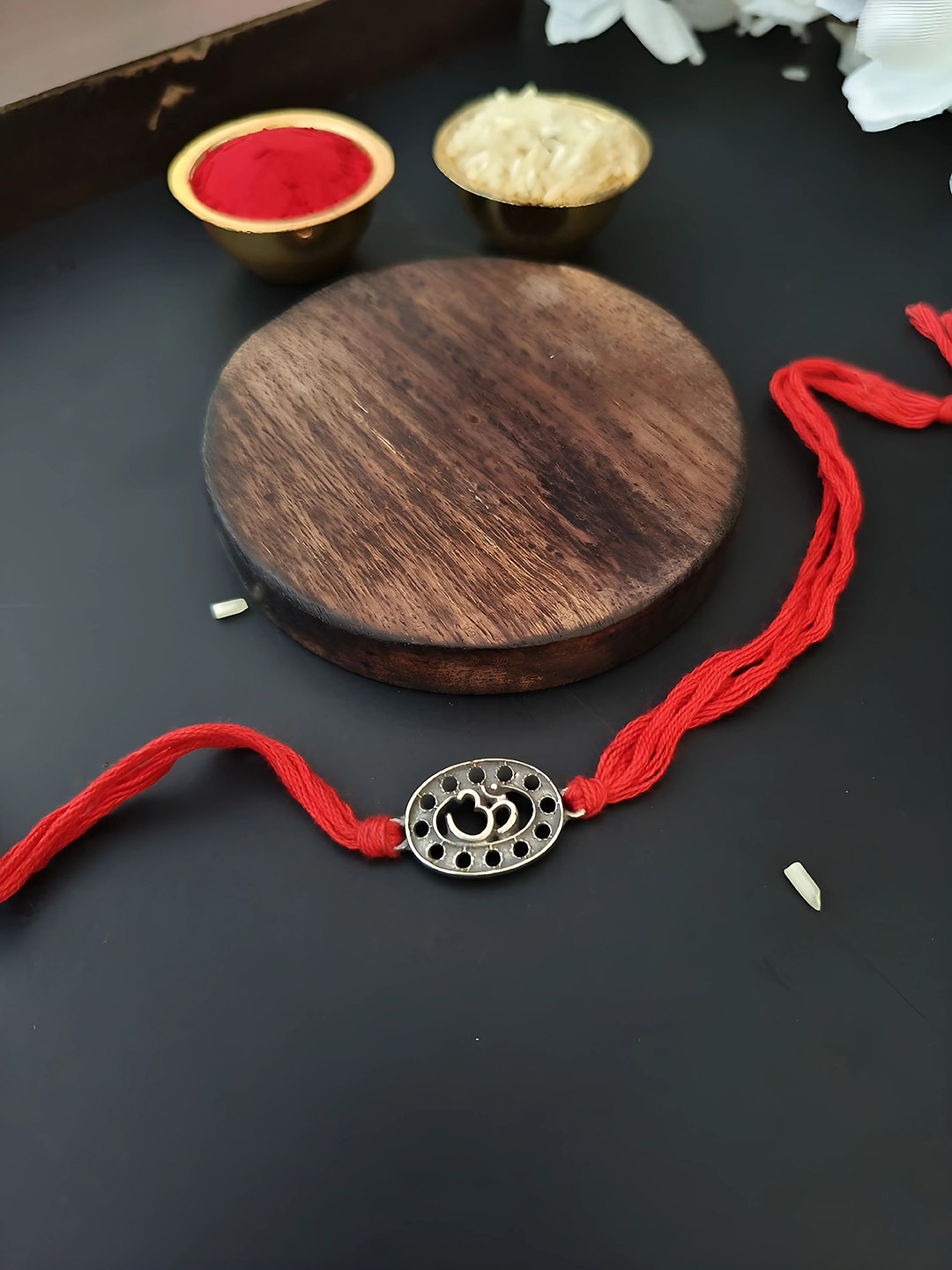 

Sangria Replica Om Thread Rakhi & Roli Chawal, Red