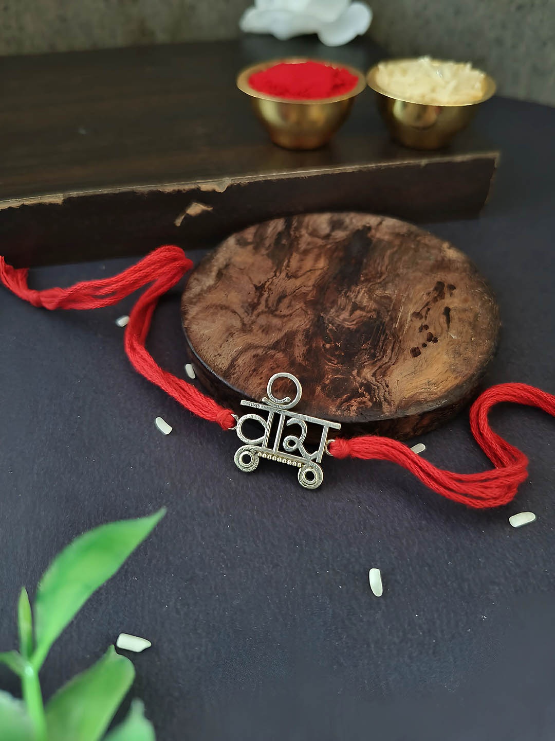 

Sangria Red Silver Plated Vira Thread Rakhi