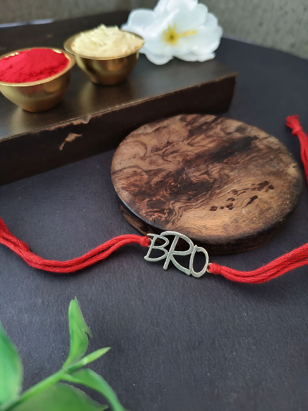 

Sangria Red Silver Plated Bro Thread Rakhi