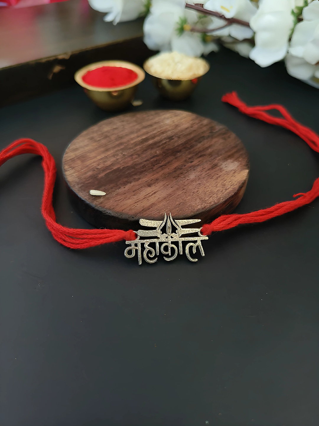 

Sangria Silver Plated Mahakal Charm Thread Rakhi With Roli Chawal, Red