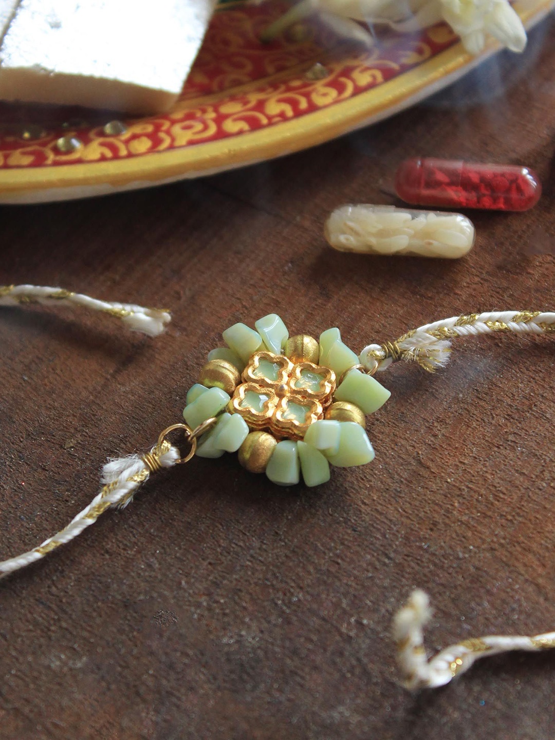 

BeAbhika Beaded Thread Rakhi With Roli & Chawal Vegan Capsules, White