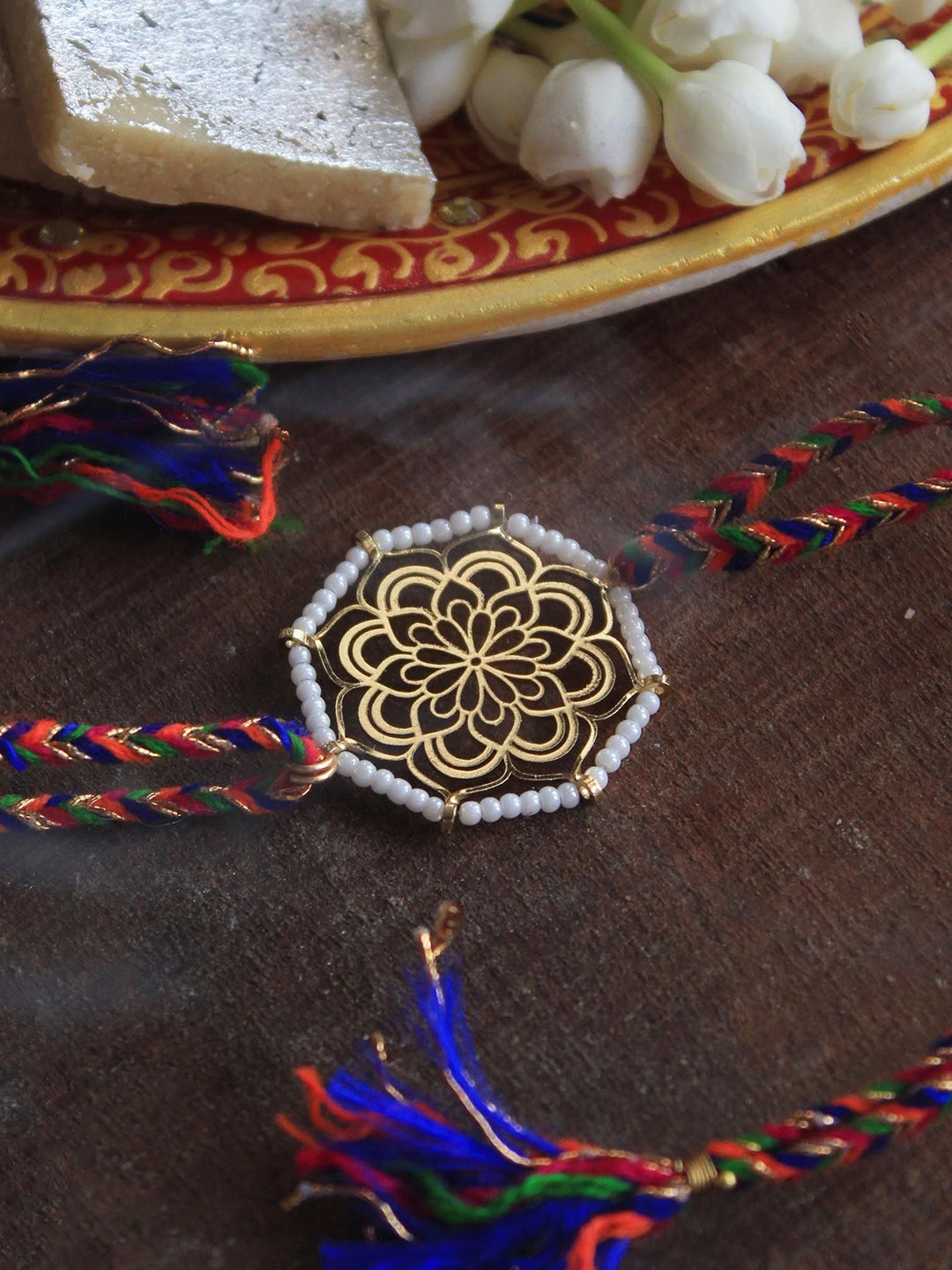 

BeAbhika Beaded Thread Rakhi With Roli Chawal, Gold