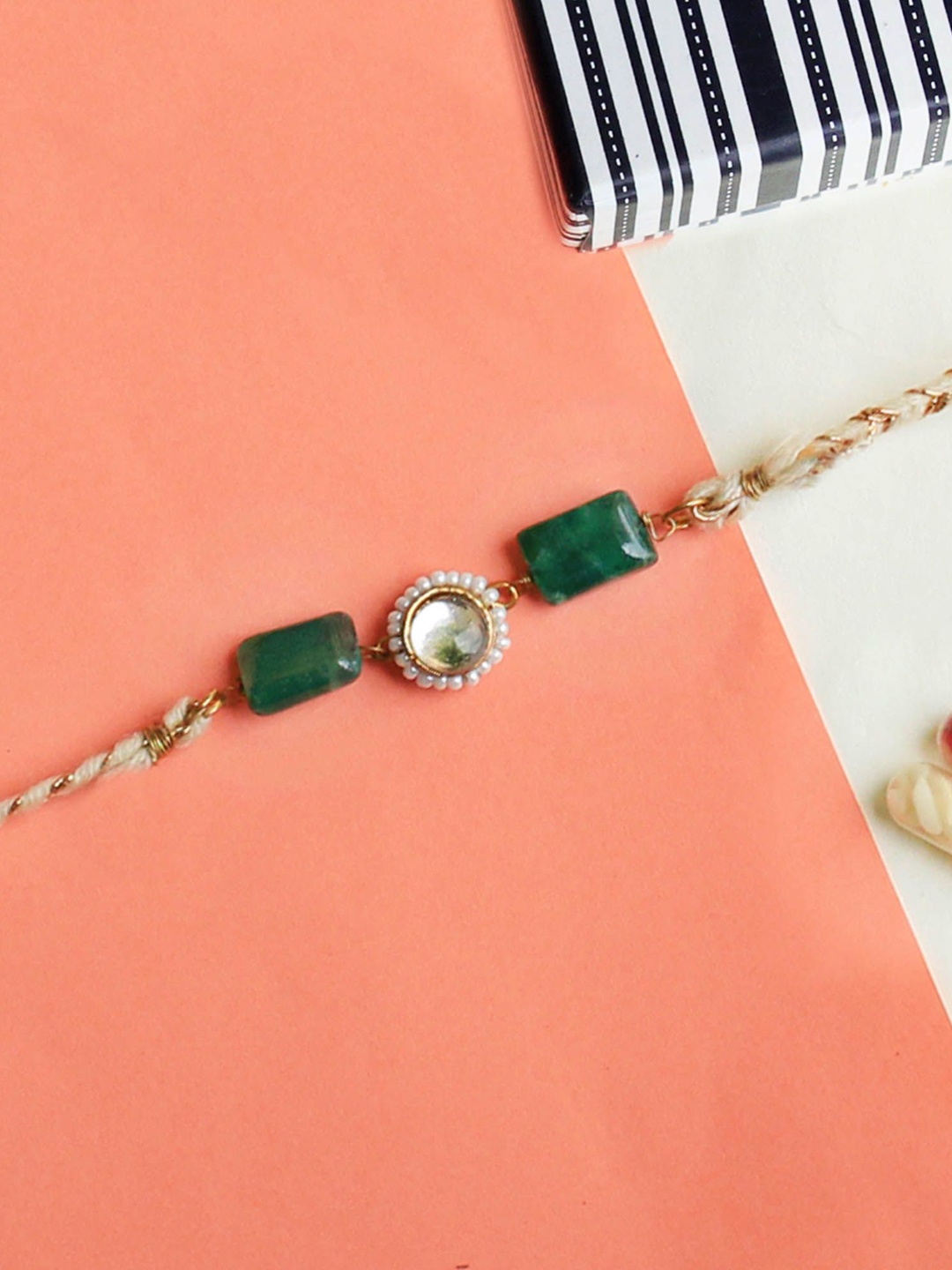 

BeAbhika Stone Studded & Beaded Thread Rakhi With Roli Chawal, Green